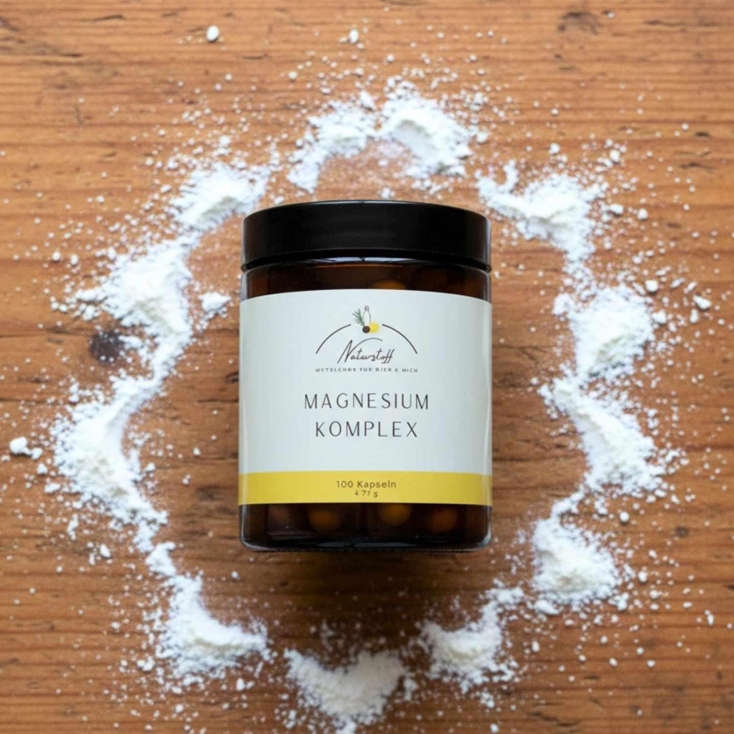 Magnesium auf Holztisch präsentiert von Naturstoff