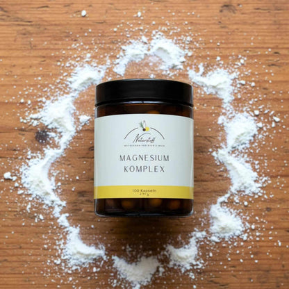 Magnesium auf Holztisch präsentiert von Naturstoff