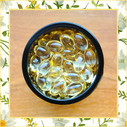 Oreganoöl Kapseln in Glastiegel auf Holztisch | Naturstoff